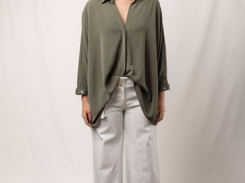 Wide view of a modern minimalist fitness studio with sunlight